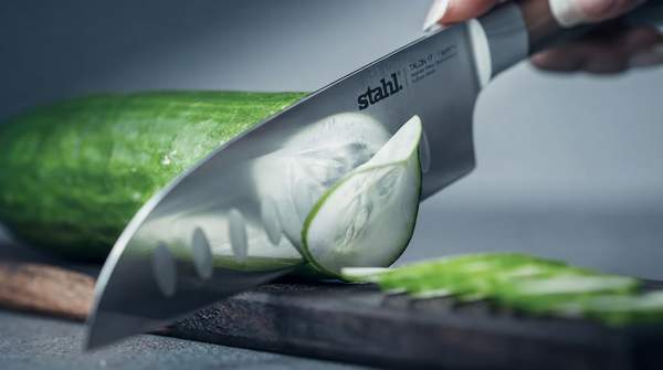 Editorial illustration for How Chef's Knife Blade Geometry Shapes Cutting Performance